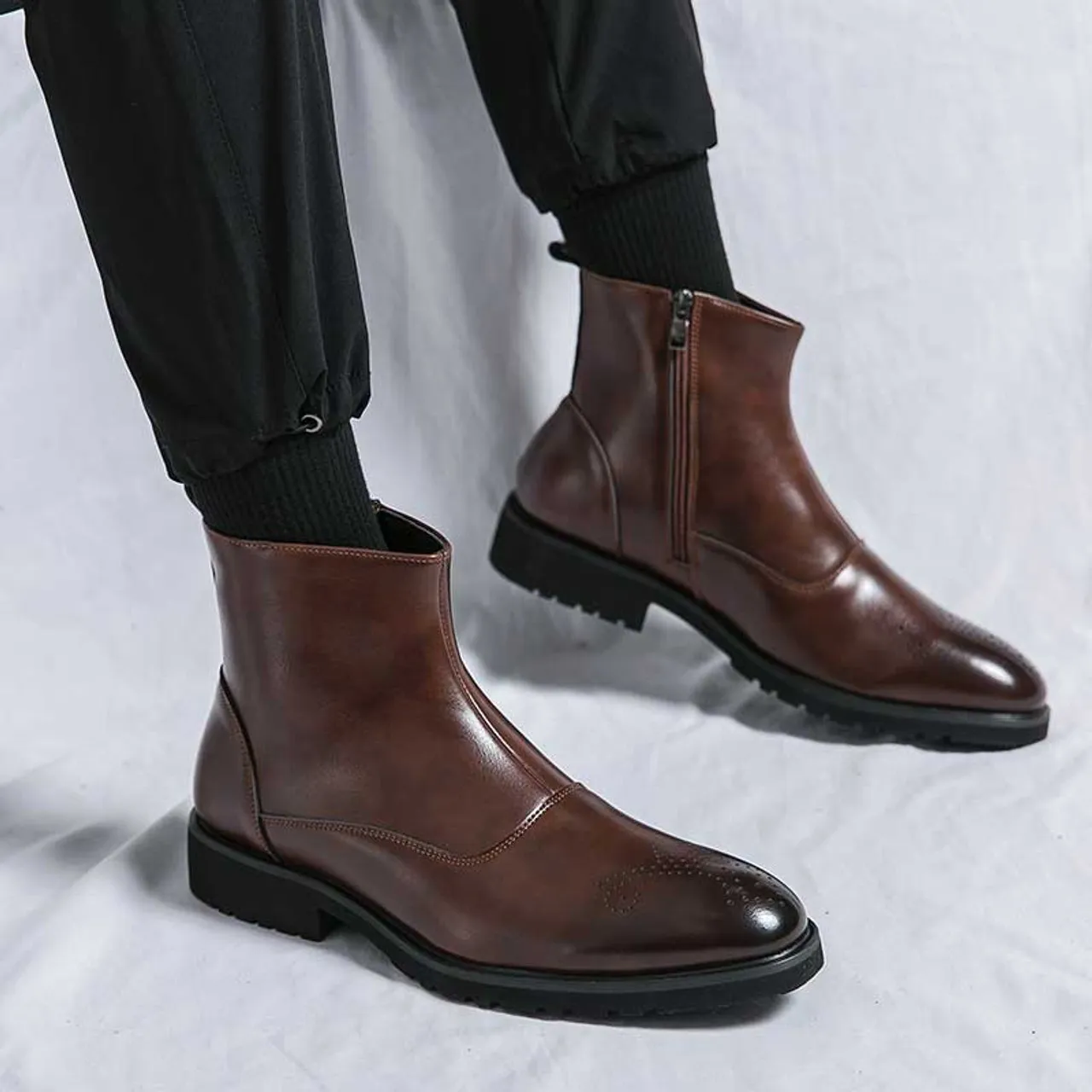 Brown brogue side zip slip on shoe boot