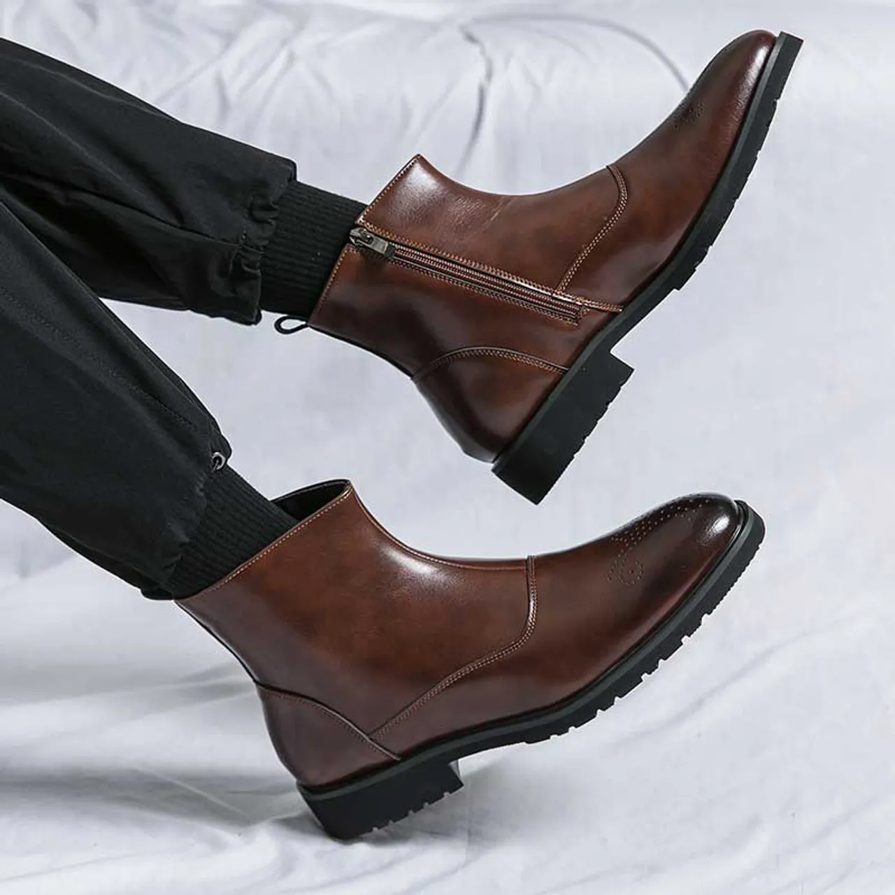 Brown brogue side zip slip on shoe boot