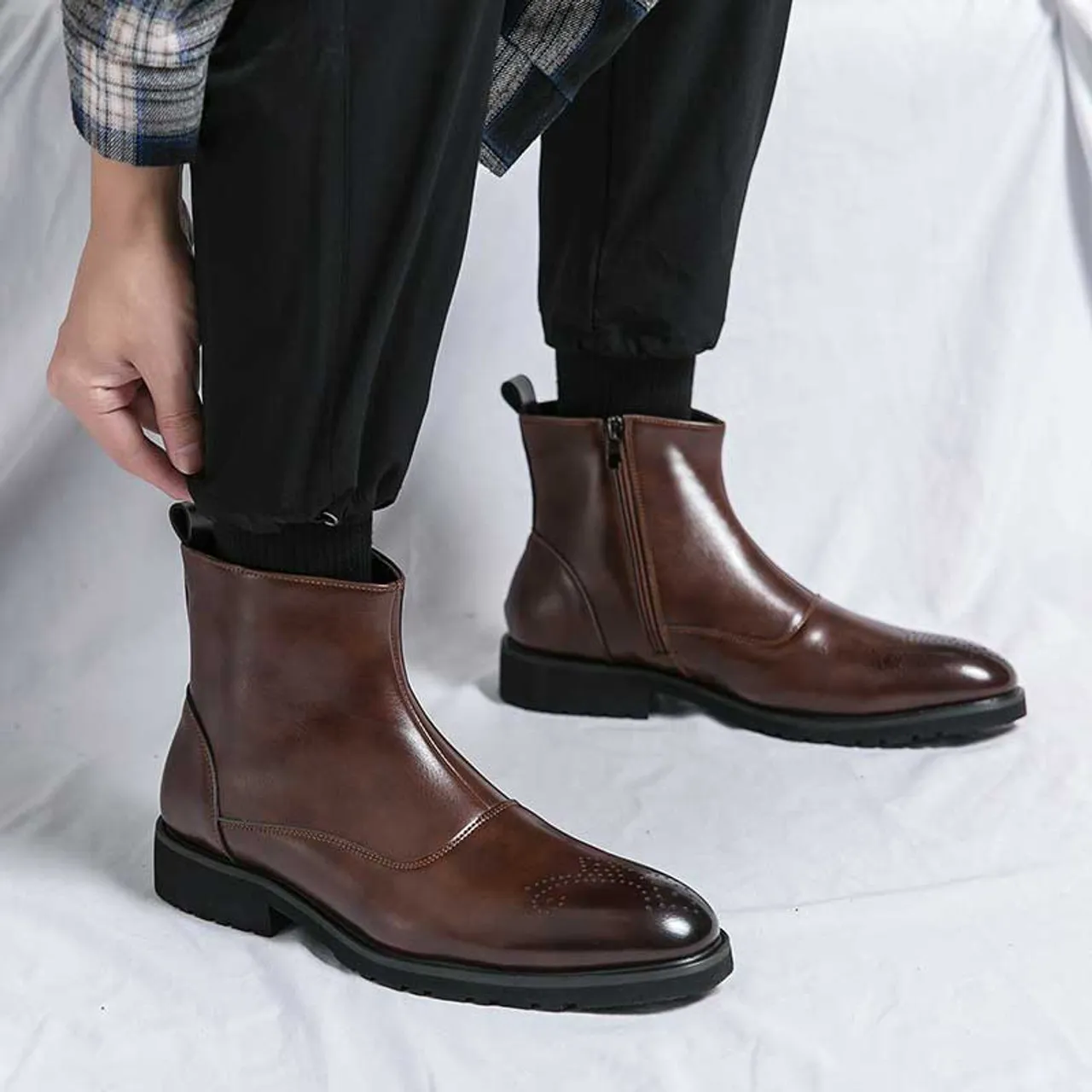 Brown brogue side zip slip on shoe boot