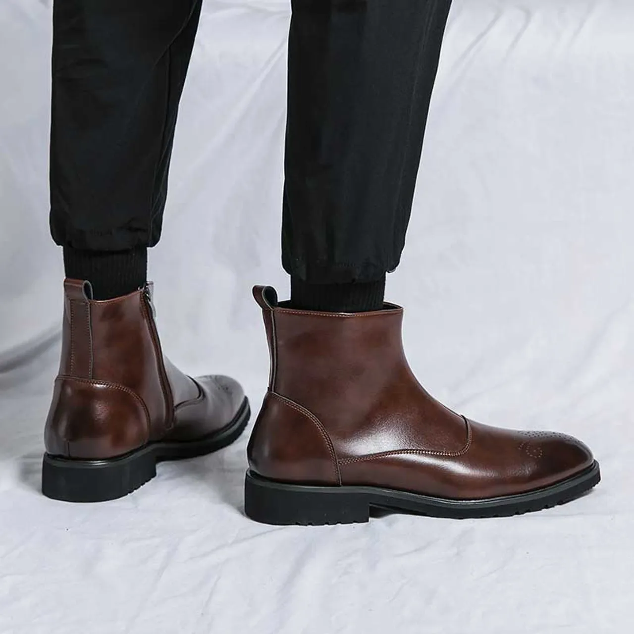 Brown brogue side zip slip on shoe boot